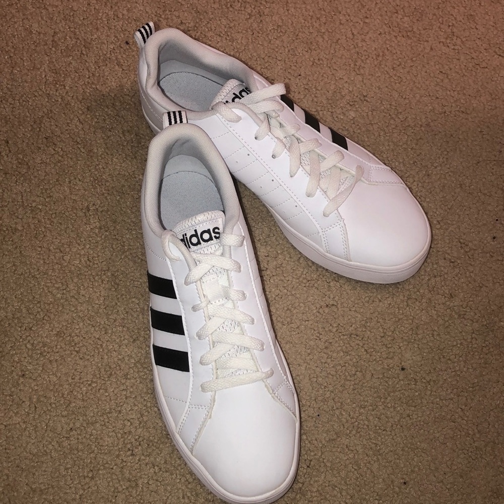 White Adidas Superstars